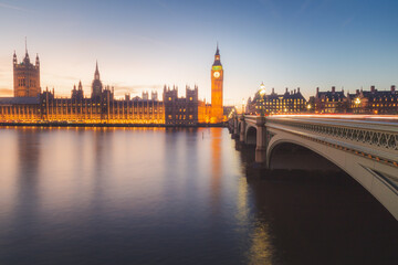 Fototapeta premium A long exposure capture at night of Elizabeth Tower formerly Big Ben of Westminster Abbey from the Thames riverside, London City, England, UK.