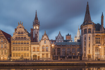 Fototapeta na wymiar The beautiful historic old town of Ghent, Belgium along the Leie Canal at dusk.