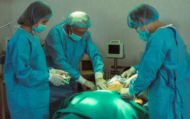 Medical team doing surgical operation at hospital