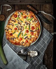 pizza on a wooden table