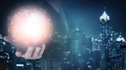 Fototapeta premium Globe inside the hand of the businessman as business idea concept.