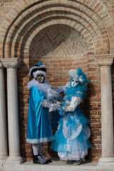 Fototapeta na wymiar city carnival masked couple