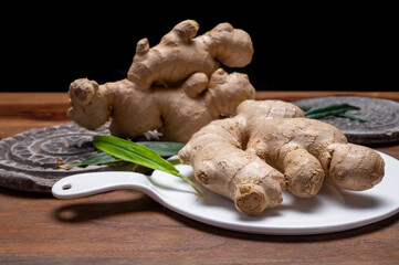 Fresh ginger rhizome root used in traditional medicines and for flavoring meals worldwide.