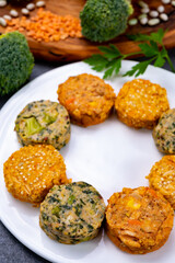 Small tasty vegan and vegetarian burgers made from fresh vegetables and dried legumes and beans
