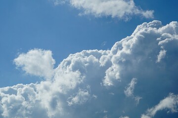 Fluffy clouds with a blue sky