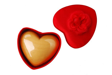 Valentine's day presents. Red gift box and heart shaped box with soap.