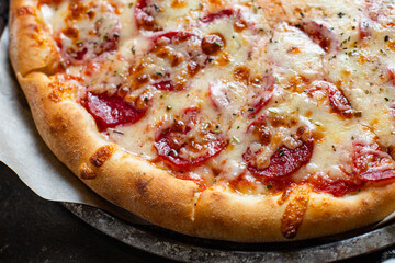 pizza pepperoni with meat sausage and double cheese fast food Takeaway ready to eat portion on the table for healthy meal snack outdoor top view copy space for text food background rustic image