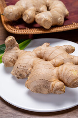 Fresh ginger rhizome root used in traditional medicines and for flavoring meals worldwide.