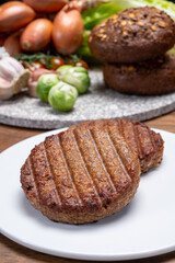 Grilled plant based, meat free vega burgers close up