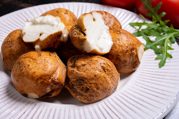 Tasty Italian food, small balls of smoked mozzarella soft cheese