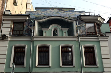 Fototapeta na wymiar A fragment of a building in Maly Kozikhinsky Lane near the Patriarchal Ponds of Moscow