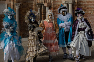 Fototapeta na wymiar elegant venice carnival masked group