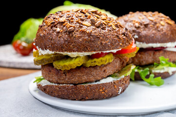 Grilled plant based, meat free vega burgers close up