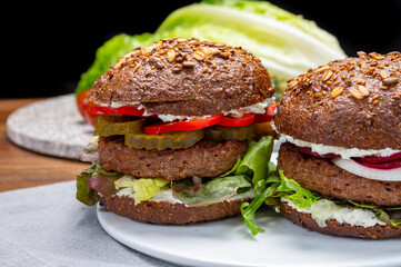 Grilled plant based, meat free vega burgers close up