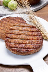 Grilled plant based, meat free vega burgers close up