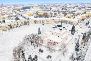 Aerial drone view of Orthodox Church of Elijah the Prophet and old city center in winter of Yaroslavl, Russia. Ancient russian city of the touristic Golden Ring.