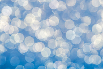 Blue christmas festive elegant abstract background with bokeh lights