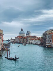 Obraz premium Romantic famouse Venice grand canal Basilica view with charming boats and gondolas 