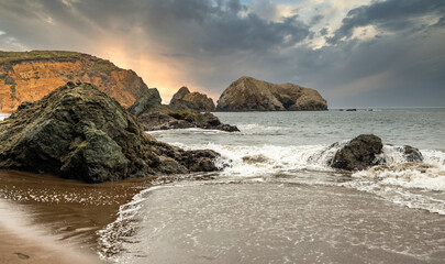 Fototapeta premium Rock formations at Rodeo Beach, California, USA, San Francisco Marine Headlands Recreation Area, beautiful landscape, California seaside.