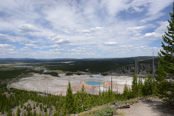View of the Grand Prismatic Spring at Yellowstone National Park from a high viewpoint on a cloudy...