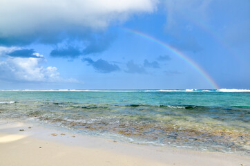 two rainbows on the beach