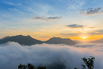 The beautiful view of the sunrise against the sea of mist at Phu Tok, Loei, Thailand.