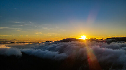 sunrise above the clouds