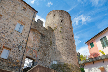 Fototapeta na wymiar Le mura esterne del cancello nel centro storico di Ameglia in provincia di La Spezia, Liguria, Italia.