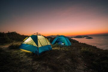 Camping on mountain top, enjoy view of sunrise at Yuk Kwai Shan (Mount Johnson) located in Ap Lei Chau,Hong Kong.