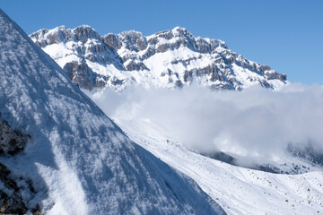 Fototapeta na wymiar peaks of snowy mountains, magnificent winter views and natural wonders
