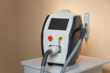 Laser tattoo removal, medical equipment. Skin care, health and beauty concept.