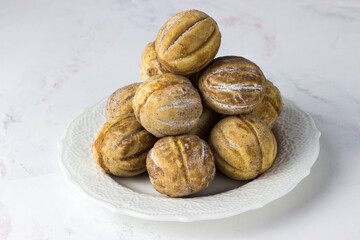 Nuts with condensed milk on a white background