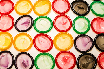Colorful condoms background.
