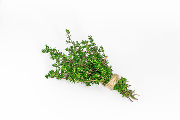 A bunch of fresh thyme on a white background