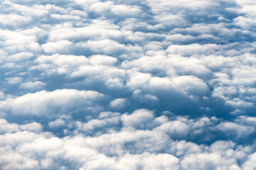Naklejka na ściany i meble Clouds in nature, high angle view