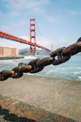 Naklejka premium Golden Gate Bridge with Chain in Foreground California USA Sunny Summer Day