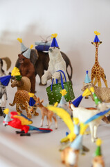 Birthday Cake On Colorful Balloon Background With Other Birthday Decoration. Animal toys