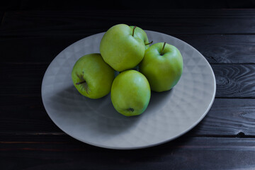 green apples on a plate