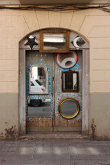 Fototapeta na wymiar Curious doors in the streets of Barcelona