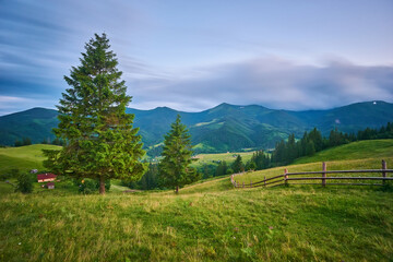 wooden fence in mountains