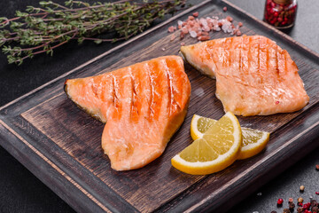 Tasty fresh red fish arctic char baked on a grill