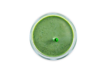 Kale banana smoothie in a glass on a white isolated background