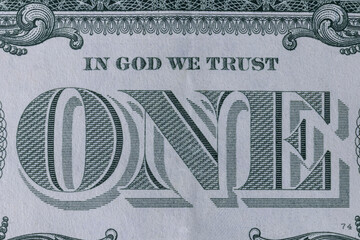 In God We Trust on a one dollar bill and is the national motto of the United States. In God We Trust is printed on every American banknote in circulation. - obrazy, fototapety, plakaty