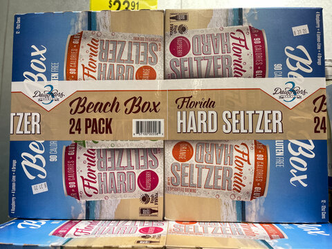 Cases of Florida Beach Box Hard Seltzer alcohol beverages at a Sams Club store.