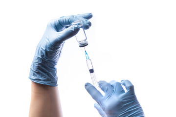 hand holding syringe and vial