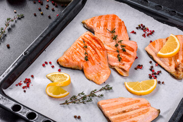 Tasty fresh red fish arctic char baked on a grill