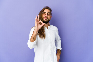 Young man with long hair look cheerful and confident showing ok gesture.