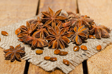 Close-up of anise star on rustic background 