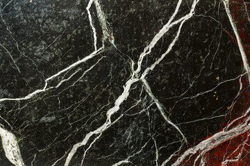 Naklejka na ściany i meble Black marble background with white stripes. Natural stone texture