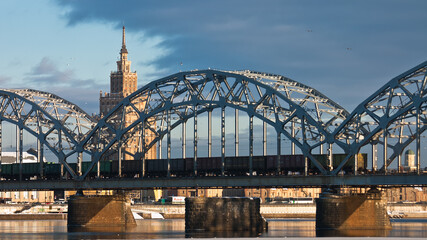 RIGA, LATVIA-January 1, 2021: in the photo, the railway bridge against the blue sky